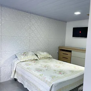Aconchego Quarto em Acomodações Particulares